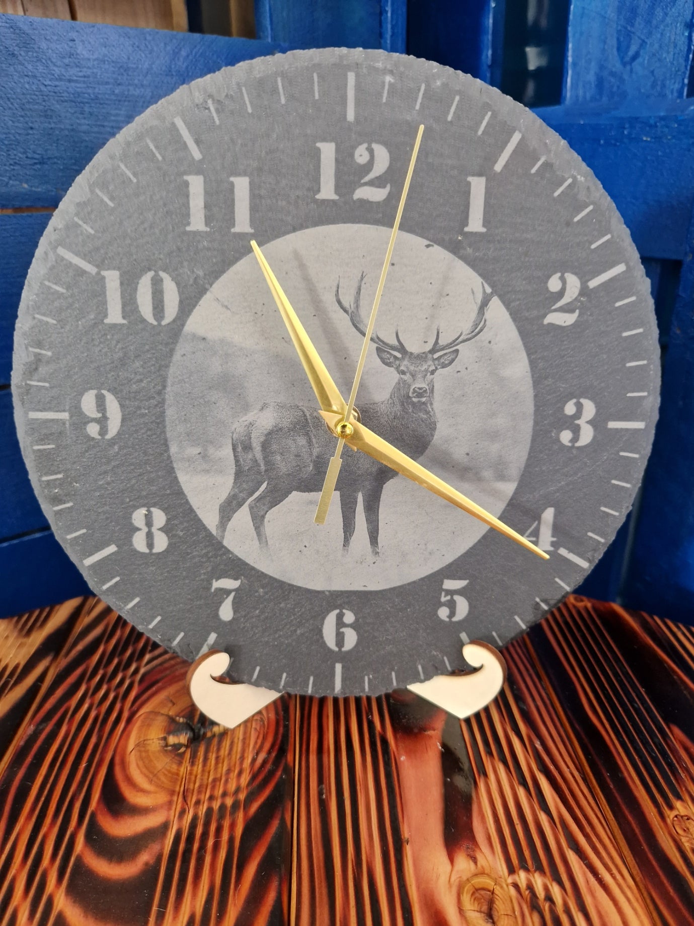 Schiefer Uhr Hirsch Foto