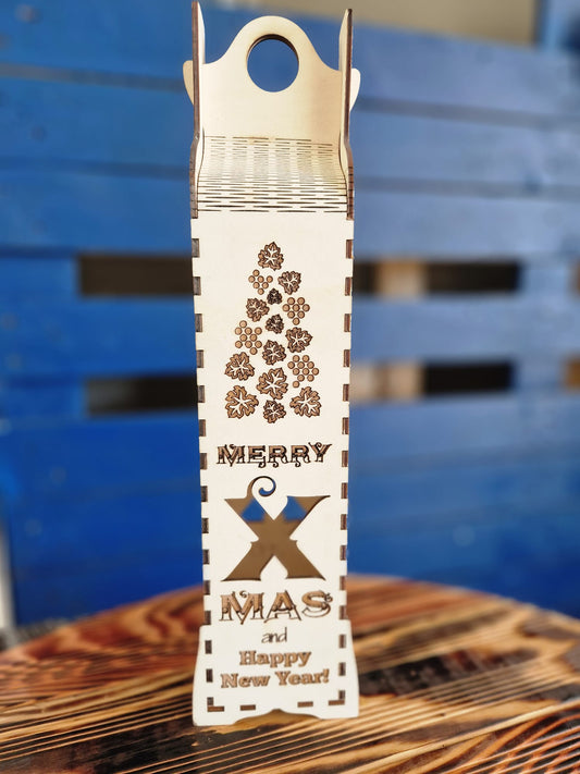 Wooden wine packaging with saying: "Merry X Mas"